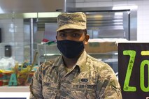 Airman 1st Class Alan Daniel, 341st Force Support Squadron food service apprentice, poses for a photo, Dec. 1, 2020, at the Elkhorn Dining Facility on Malmstrom Air Force Base, Mont. Daniel and the food service Airmen work hands-on with contracted chefs and also serve food during meals. (U.S. Air Force photo by Airman Elijah Van Zandt)