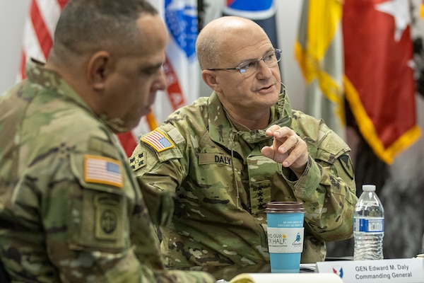 Gen. Edward Daly, U.S. Army Materiel Command commanding general, held a discussion with leaders of the U.S. Army Financial Management Command while Command Sgt. Maj. Alberto Delgado, AMC senior enlisted advisor, listens during a quarterly update at the Maj. Gen. Emmett J. Bean Federal Center in Indianapolis Nov. 20, 2020. The visit was the first in-person visit made by Daly and Delgado to USAFMCOM since the general took command of AMC in July. (U.S. Army photo by Mark R. W. Orders-Woempner)