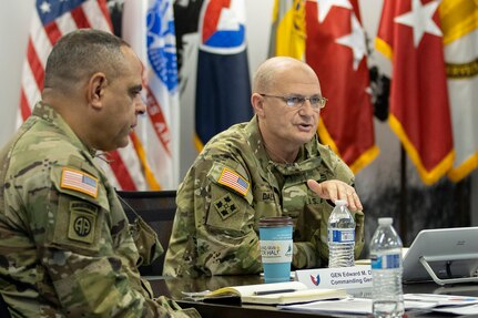 Gen. Edward Daly, U.S. Army Materiel Command commanding general, held a discussion with leaders of the U.S. Army Financial Management Command while Command Sgt. Maj. Alberto Delgado, AMC senior enlisted advisor, listens during a quarterly update at the Maj. Gen. Emmett J. Bean Federal Center in Indianapolis Nov. 20, 2020. The visit was the first in-person visit made by Daly and Delgado to USAFMCOM since the general took command of AMC in July. (U.S. Army photo by Mark R. W. Orders-Woempner)