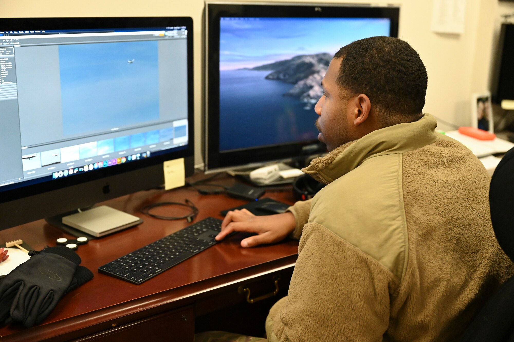U.S. Air Force Senior Airman David Richardson, 14th Operations Support squadron aircrew flight equipment technician, looks through his recently captured photos on Microsoft Bridge Nov. 30, 2020, on Columbus Air Force Base, Miss. The Department of Defense uses a variety of editing software to include Microsoft Bridge, Premier, Photoshop and InDesign as an effort to ensure quality products are being produced. (U.S. Air Force photo by Airman 1st Class Jessica Williams)
