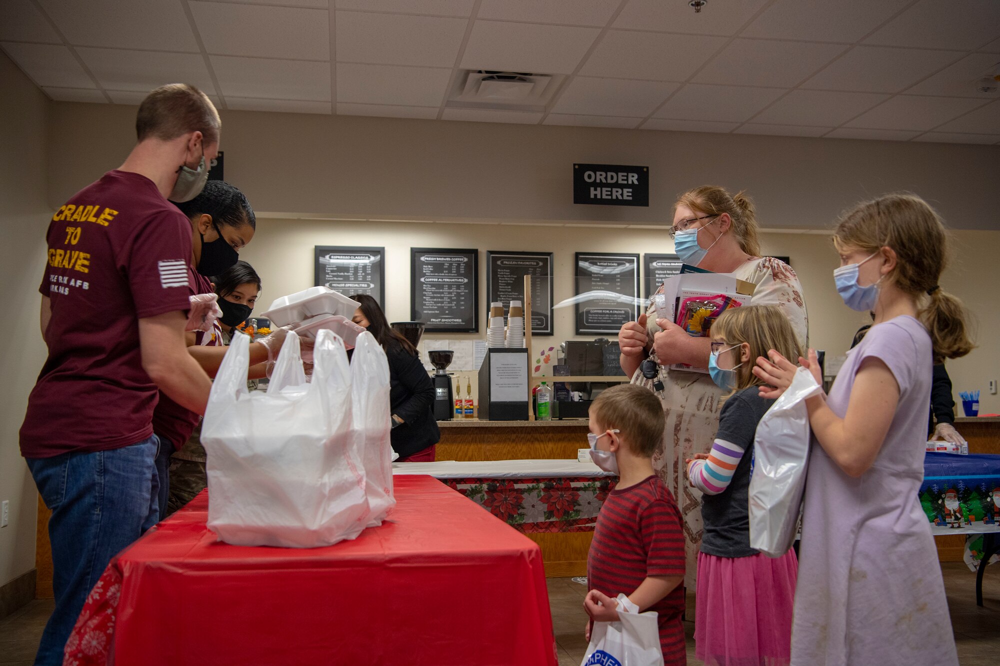 More pictures of Herk Nation family members attending a Deployed Family Dinner.