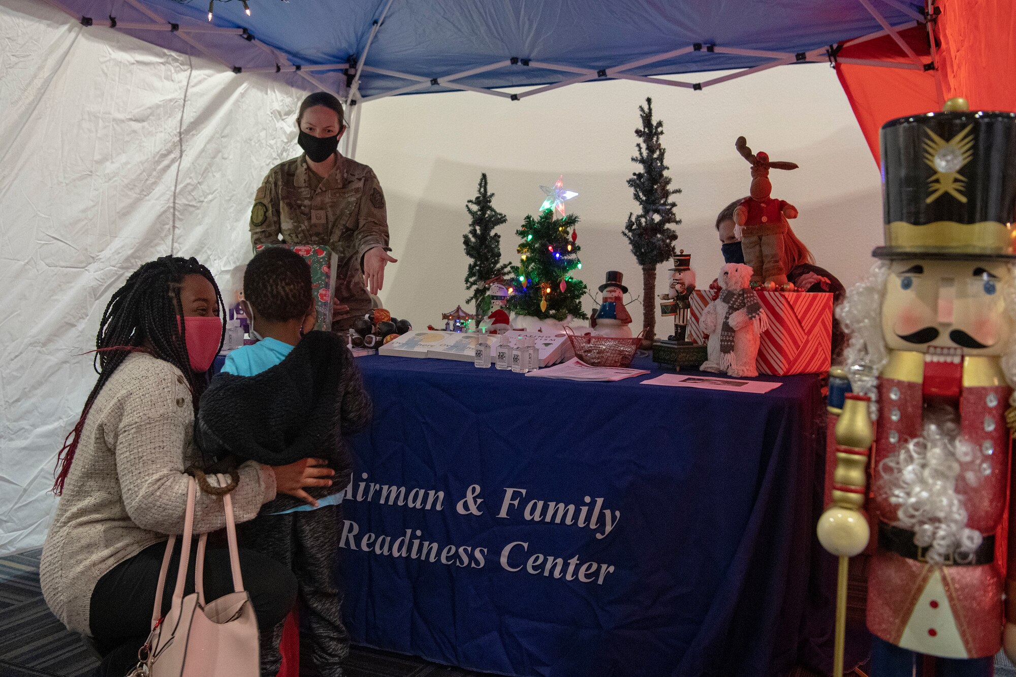 Deployed family members speak with members from the Airman and Family Readiness Center.