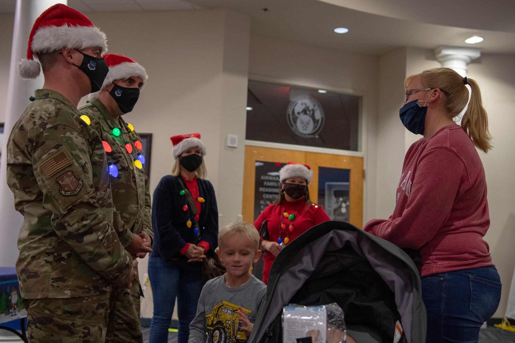 The installation commander speaks with family members of deployed Airmen.