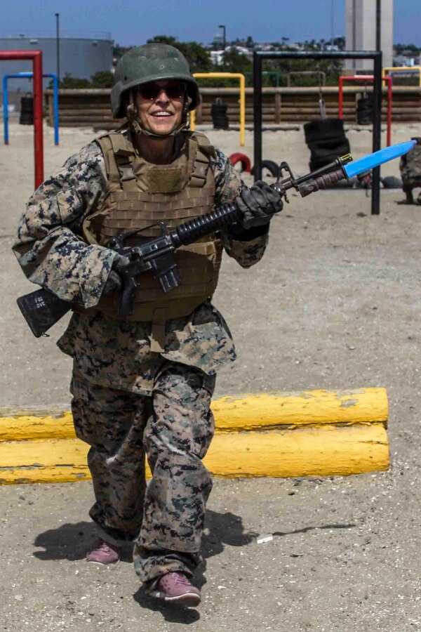Janet Bonovich, a teacher at Temescal Canyon High School, runs during the Bayonet Assault Course as part of the Educators Workshop at Marine Corps Recruit Depot San Diego, California, June 18, 2019. The mission of the Educators Workshop is to inform, demonstrate and build relationships while providing educators and community influencers with firsthand knowledge of the Marine Corps recruiting process, entry level training, job opportunities and educational benefits available to Marines. (U.S. Marine Corps photo by Sgt. Bernadette Plouffe)