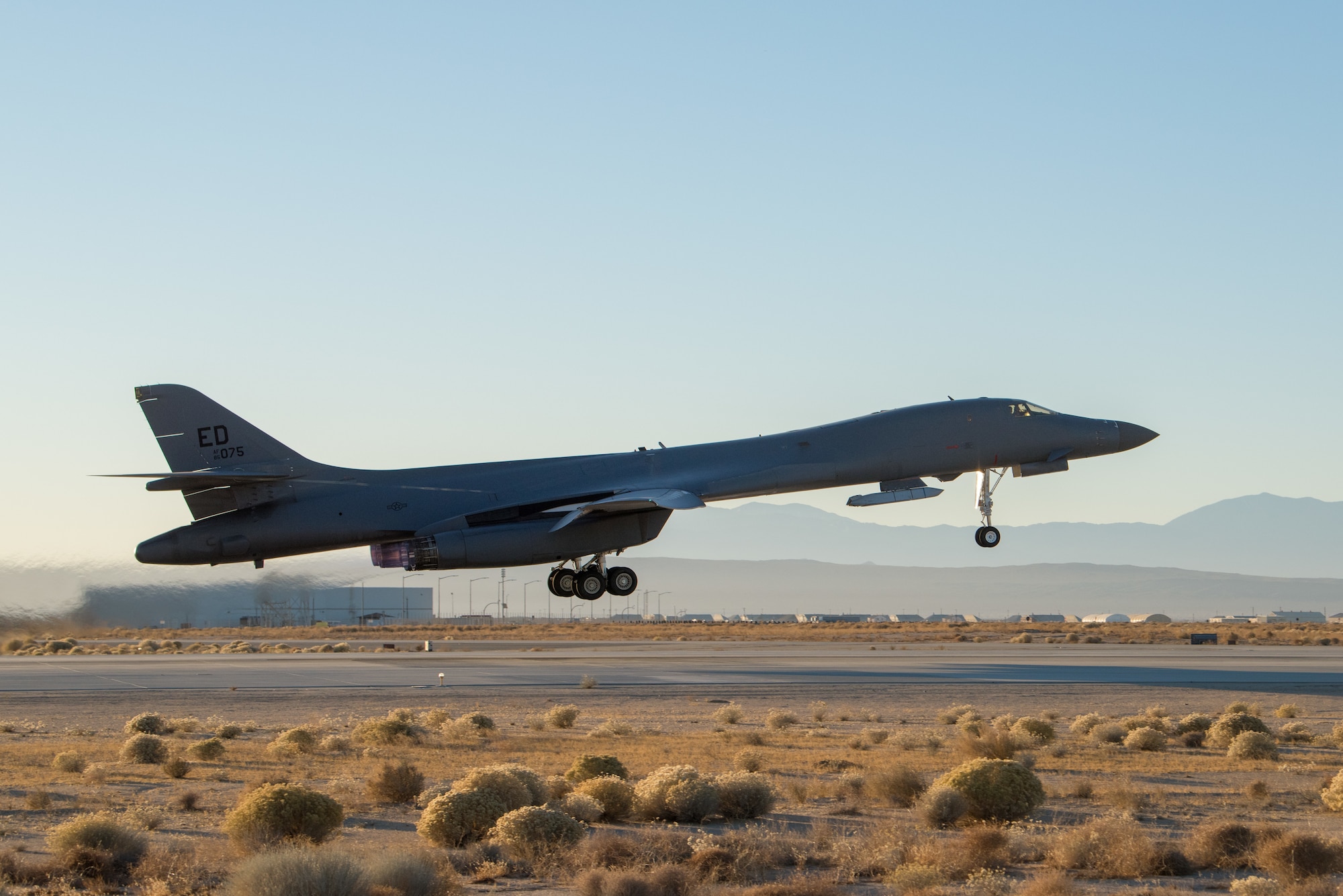 A B-1B Lancer assigned to the 419th Flight Test Squadron, 412th Test Wing, takes off from Edwards Air Force Base, California, Dec. 4. The mission’s flight crew conducted an external release demonstration with a Joint Air-to-Surface Standoff Missile attached to an external pylon. (Air Force photo by Richard Gonzales)