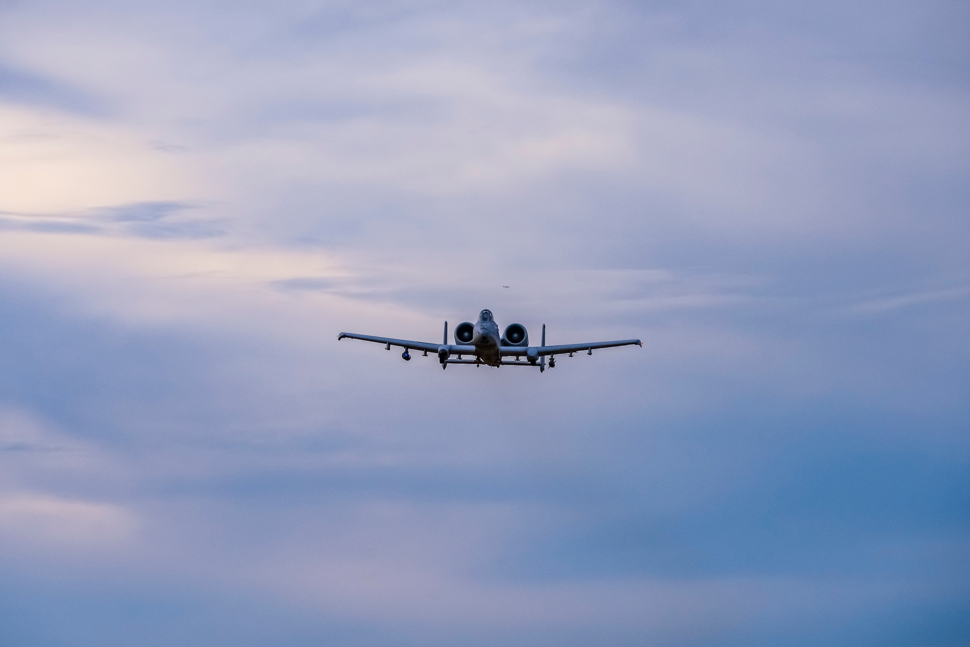 A photo of an A-10 Thunderbolt II flying over the Warren Grove Gunnery Range