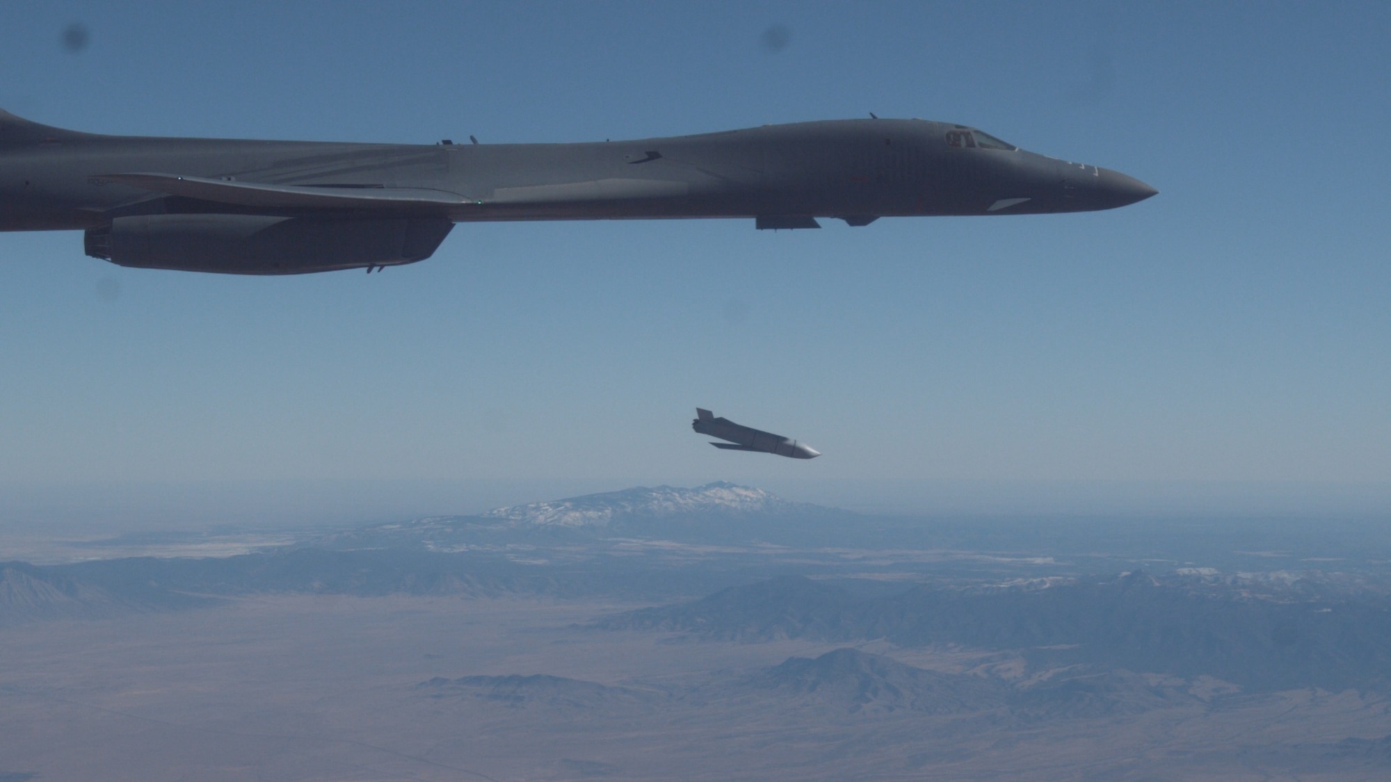 A B-1B Lancer assigned to the 419th Flight Test Squadron, 412th Test Wing, releases a Joint Air-to-Surface Standoff Missile during an external release demonstration in the skies over Holloman Air Force Base, New Mexico, Dec. 4. (Air Force photo by Ethan Wagner)