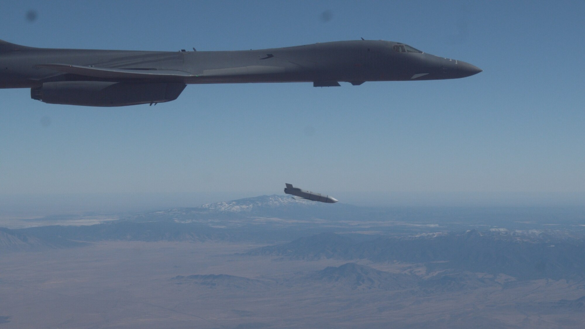 A B-1B Lancer assigned to the 419th Flight Test Squadron, 412th Test Wing, releases a Joint Air-to-Surface Standoff Missile during an external release demonstration in the skies over Holloman Air Force Base, New Mexico, Dec. 4. (Air Force photo by Ethan Wagner)