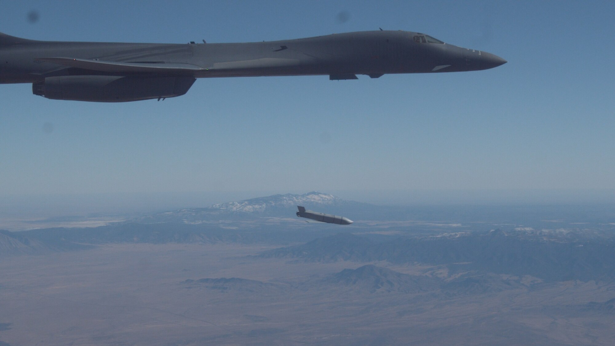 A B-1B Lancer assigned to the 419th Flight Test Squadron, 412th Test Wing, releases a Joint Air-to-Surface Standoff Missile during an external release demonstration in the skies over Holloman Air Force Base, New Mexico, Dec. 4. (Air Force photo by Ethan Wagner)