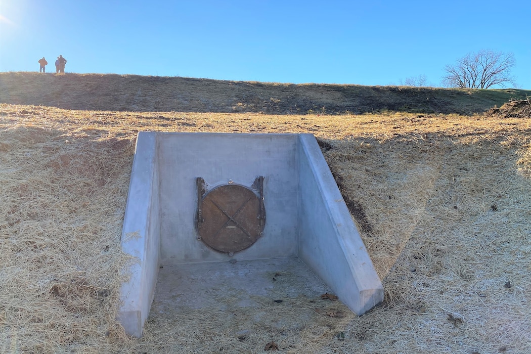 levee gate surrounded by sand