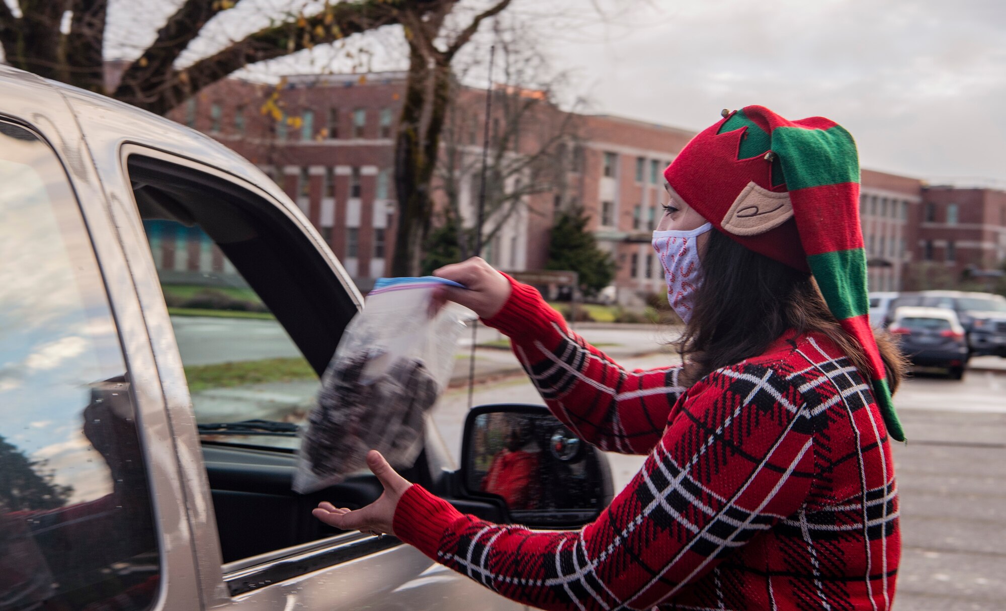 Volunteers prepare more than 1,000 dozen cookies for Operation Cookie Drop Dec. 9, 2020, at Joint Base Lewis-McChord, Wash. The goal of the operation is to provide a dozen cookies for every Team McChord dorm resident Airman. (U.S. Air Force photo by Senior Airman Tryphena Mayhugh)