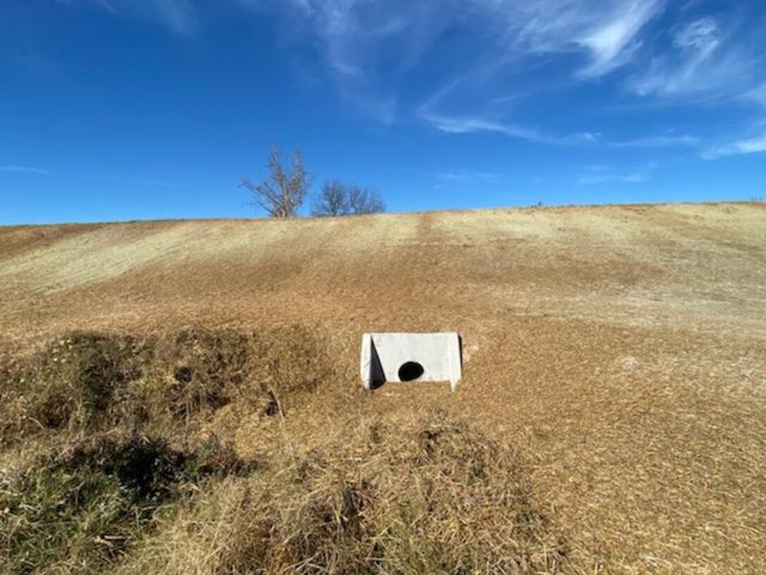 culvert in a levee wall embankment