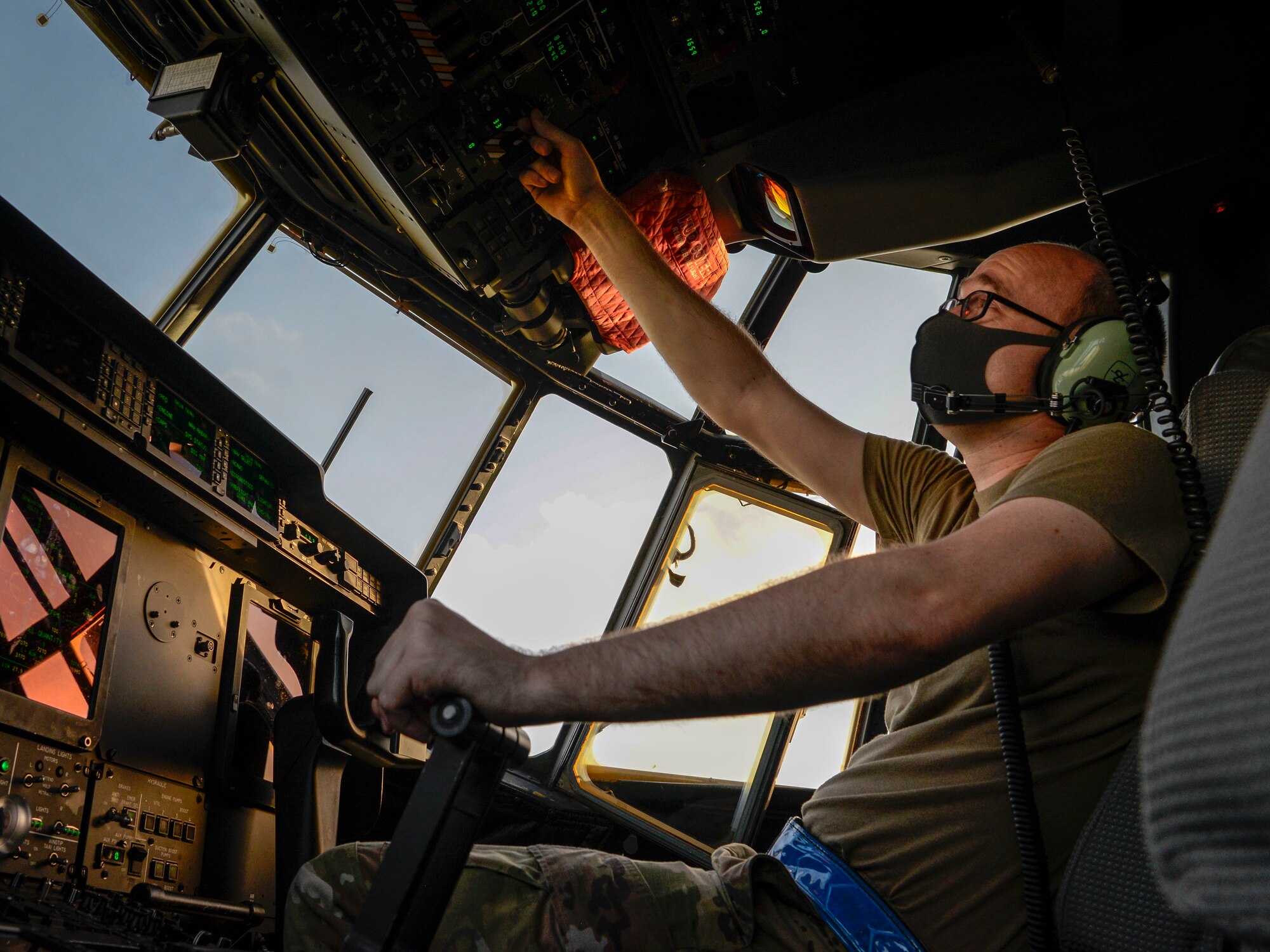 Staff Sgt. Joshua Smith, 374th Aircraft Maintenance Squadron integrated flight controls systems craftsman from Yokota Air Base, Japan, goes over the C-130J Super Hercules’ instruments during a pre-flight inspection during Operation Christmas Drop 2020 at Andersen Air Force Base, Guam, Dec. 9.