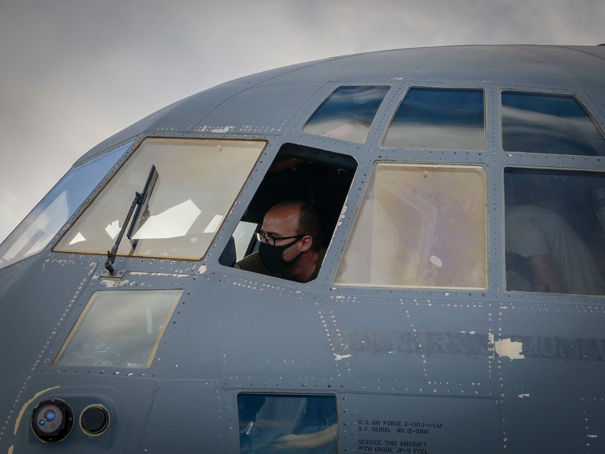 Staff Sgt. Joshua Smith, 374th Aircraft Maintenance Squadron integrated flight controls systems craftsman from Yokota Air Base, Japan, goes over the C-130J Super Hercules’ instruments during a pre-flight inspection during Operation Christmas Drop 2020 at Andersen Air Force Base, Guam, Dec. 9.