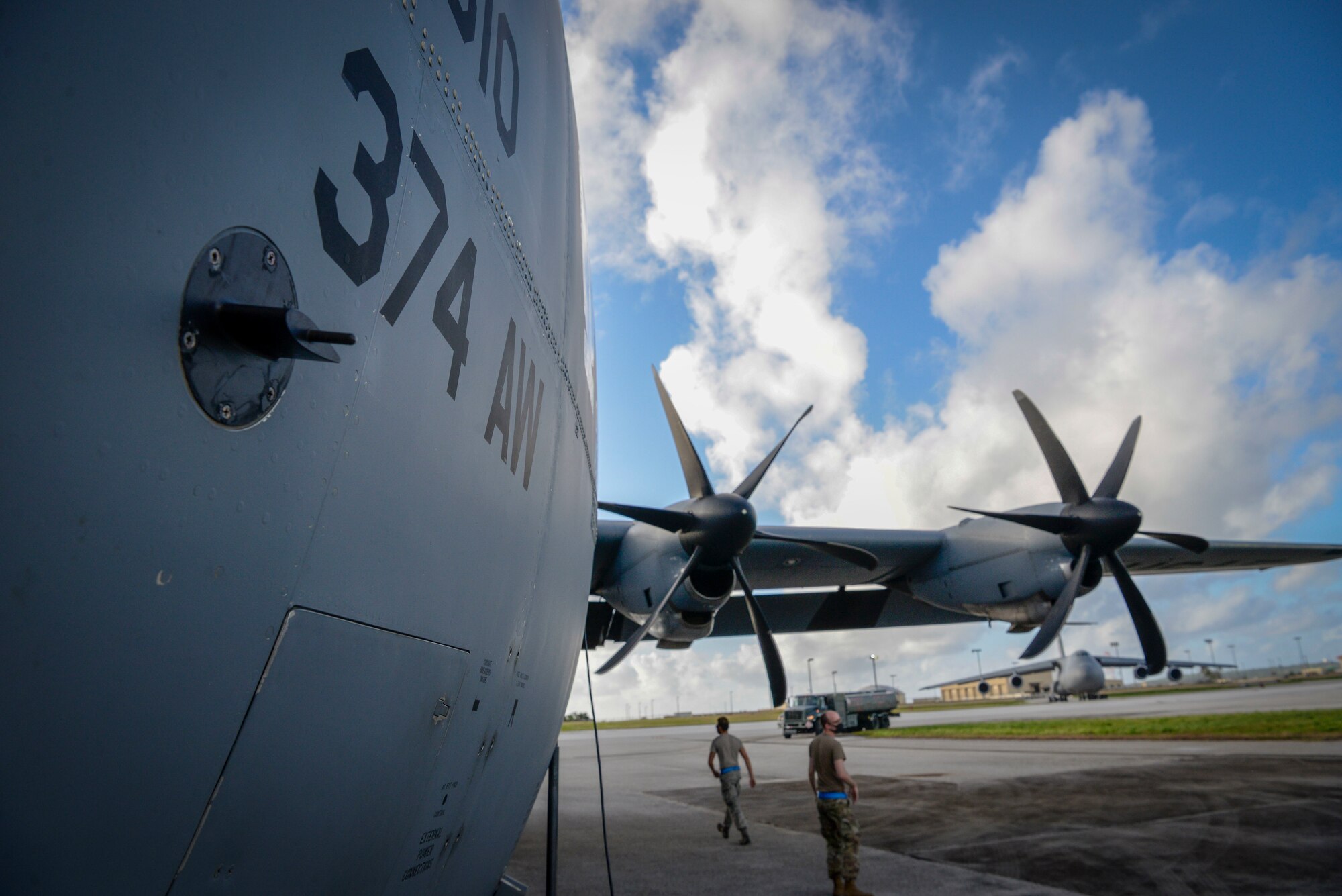 Airmen from the 374th Aircraft Maintenance Squadron out of Yokota Air Base, Japan, inspect the propellers of a C-130J Super Hercules during Operation Christmas Drop 2020 at Andersen Air Force Base, Guam, Dec. 9.