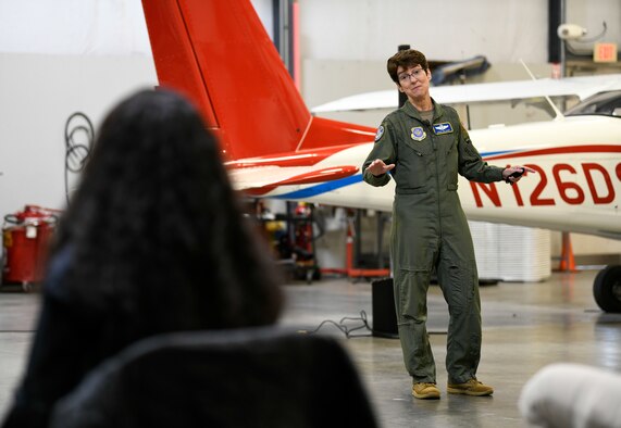 Gen. Jacqueline Van Ovost, Air Mobility Command commander, speaks at a civic outreach event during her visit to Delaware Air Park, Cheswold, Delaware, Dec. 8, 2020. Van Ovost met with ROTC and aviation students from Delaware State University and the University of Delaware to discuss the wealth of opportunities available in civilian aviation, the United States Air Force and United States Space Force. (U.S. Air Force photo by Senior Airman Christopher Quail)