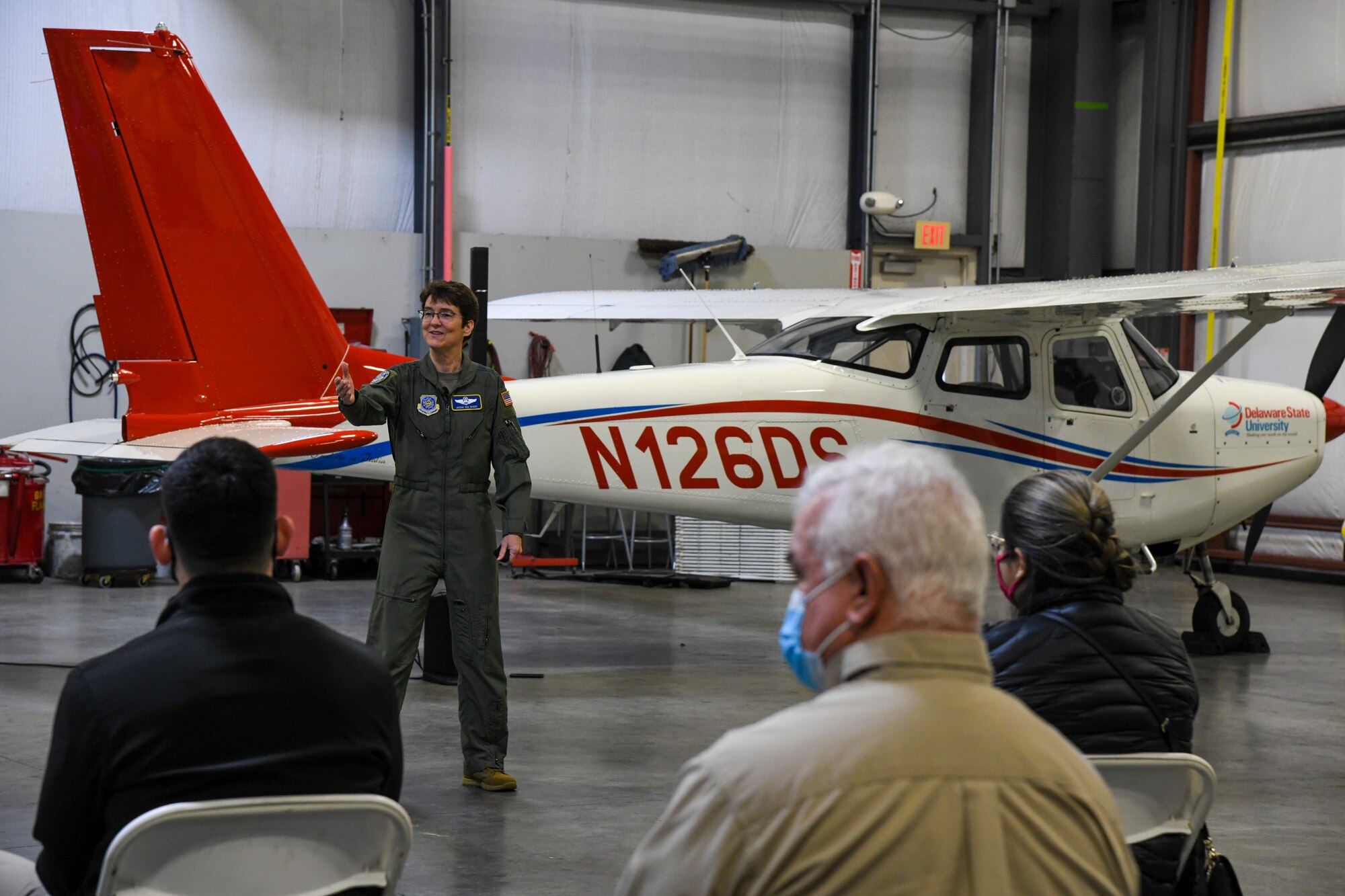 Gen. Jacqueline Van Ovost, Air Mobility Command commander, speaks at a civic engagement at Delaware Air Park, Cheswold, Delaware, Dec. 8, 2020. As a part of her visit to Dover Air Force Base, Delaware, Van Ovost met with ROTC and aviation students from Delaware State University and the University of Delaware to discuss the wealth of opportunities available in civilian aviation, the United States Air Force and United States Space Force. (U.S. Air Force photo by Airman 1st Class Stephani Barge).