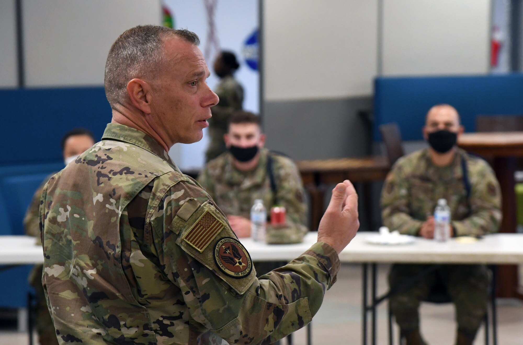 U.S. Air Force Chief Master Sgt. Erik Thompson, command chief of Air Education and Training Command, speaks to military training leaders at the Levitow Training Support Facility at Keesler Air Force Base, Mississippi, Dec. 8, 2020. MTLs are force generators and the first link in the chain of command for Airmen in technical training.  (U.S. Air Force photo by Kemberly Groue)