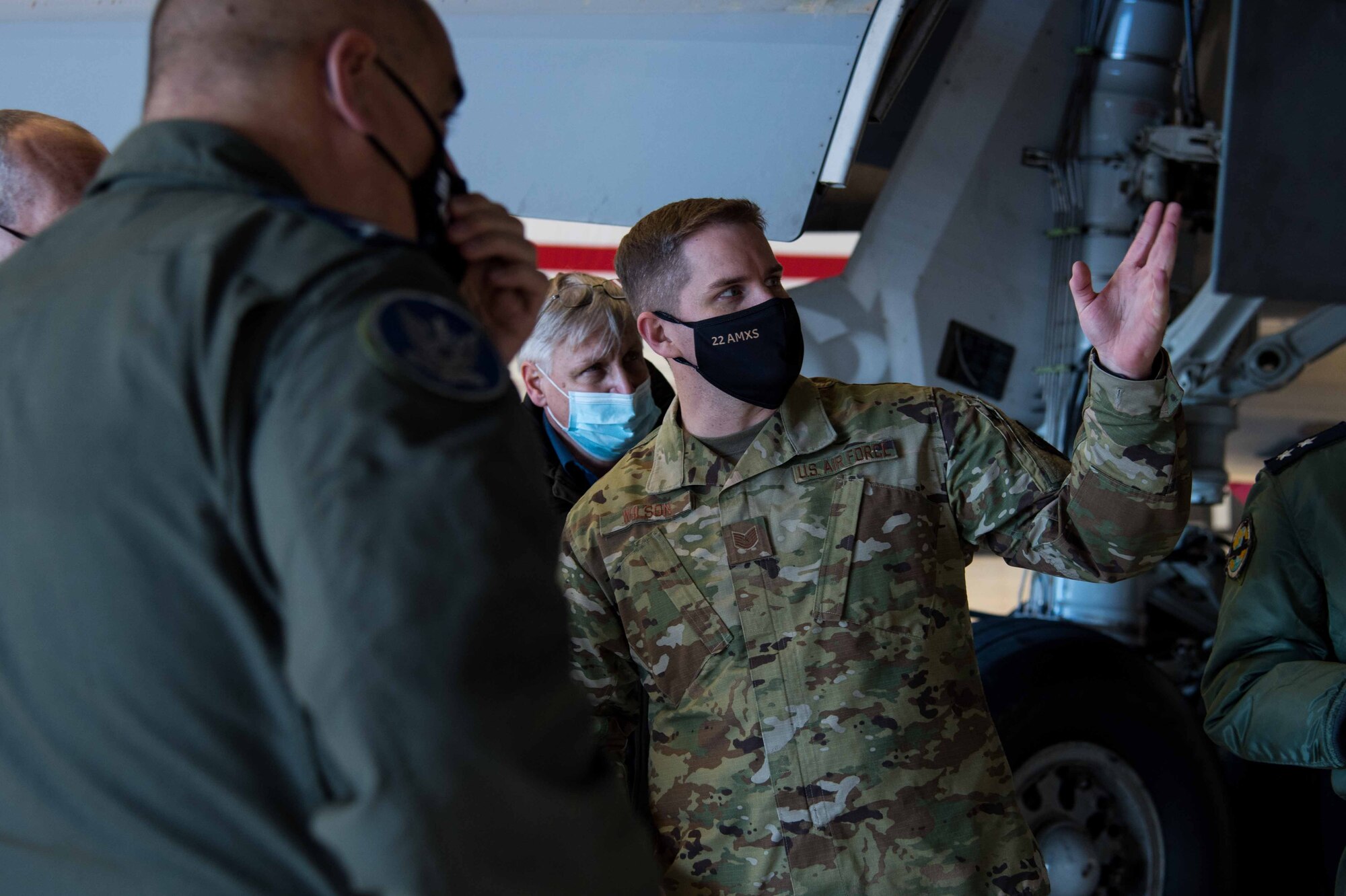 Tech. Sgt. Matthew Wilson, 22nd Aircraft Maintenance Squadron aerospace maintenance section noncommisioned officer in charge, gives Israeli Air Force members a tour of the KC-46A Pegasus’ exterior during their visit Dec. 8, 2020 at McConnell Air Force Base, Kansas.