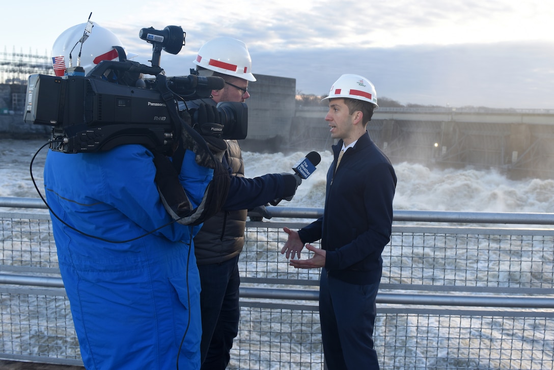The Weather Channel National News Correspondent Justin Michaels interviews Anthony Rodino, U.S. Army Corps of Engineers Nashville District Water Management Section chief, from Old Hickory Dam at Cumberland River mile 216.2 as the dam discharges water at a rate of 102,000 cubic feet per second Feb. 27, 2019 in Old Hickory, Tennessee. Rodino is featured in a new educational video that highlights how the Nashville District manages water in the Cumberland River Basin. (USACE photo by Lee Roberts)