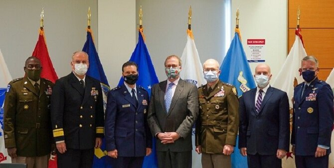 Image of a group of military’s top medical leaders posing for a photo.