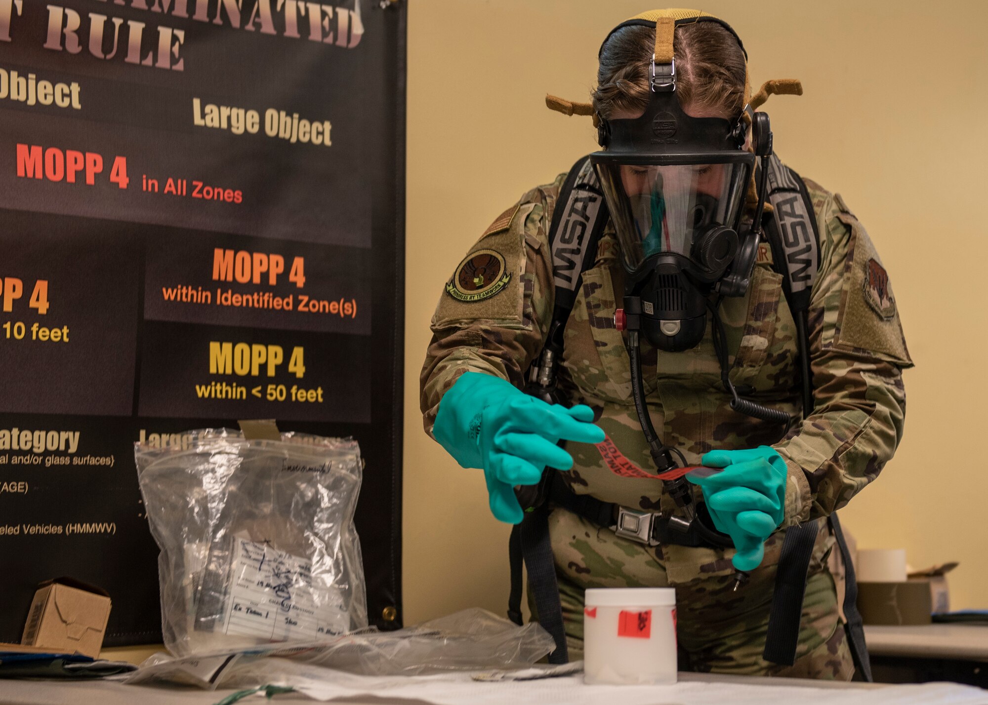 Airman 1st Class Delaney Thompson, 4th Civil Engineer Squadron emergency manager, prepares a sample for testing during training at Seymour Johnson Air Force Base, North Carolina, Nov. 19, 2020.