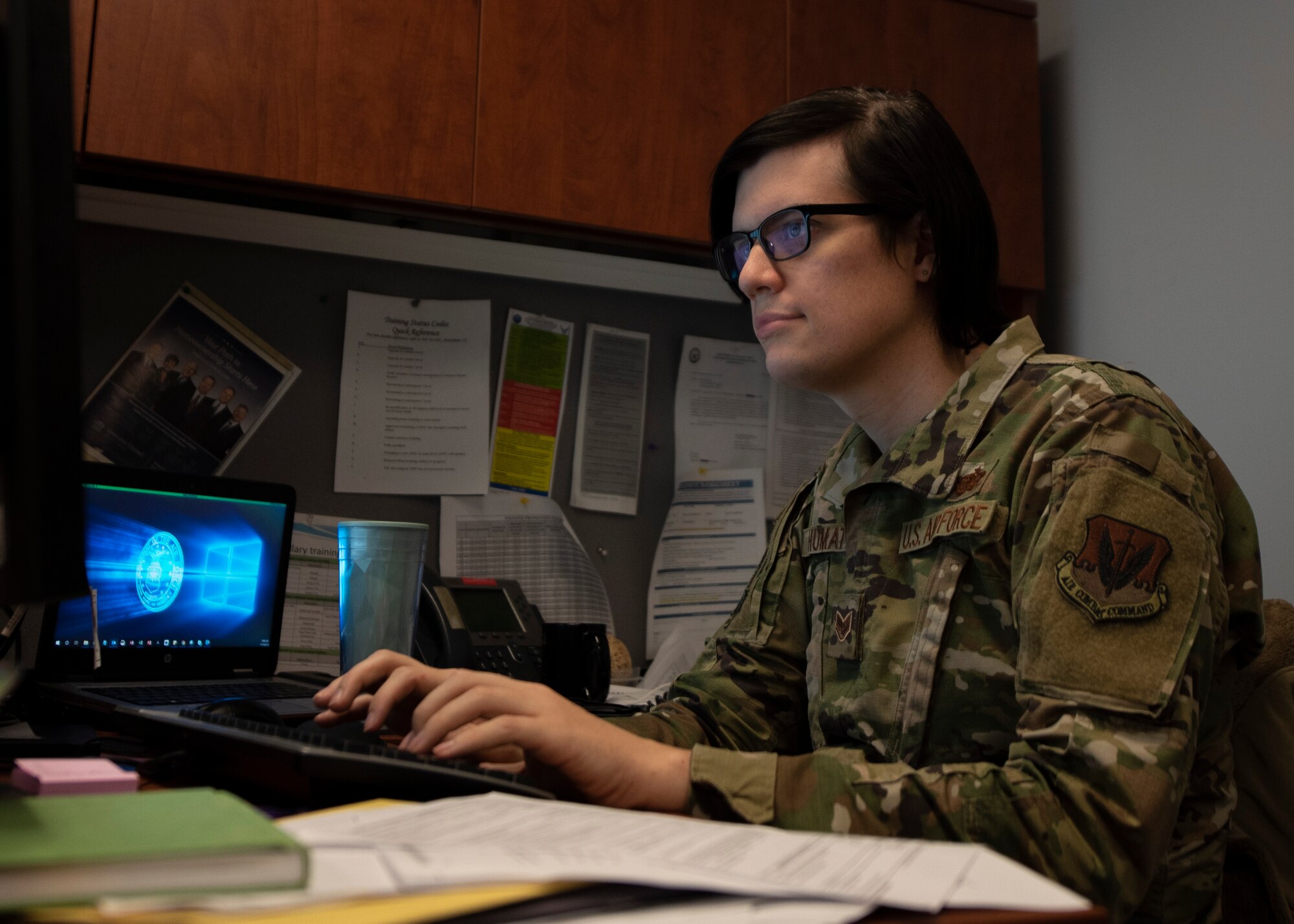Staff Sgt. May F. Shumate, 4th Communications Squadron non-commissioned officer in charge, reviews information on a computer at Seymour Johnson Air Force Base, North Carolina, Nov. 16, 2020.
