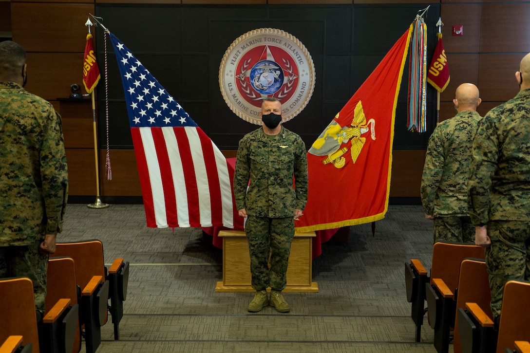 A U.S. Marine receives honors during the MARFORNORTH transfer of authority ceremony between U.S. Marine Corps Forces Reserve and MARFORCOM, FMFLANT at Naval Support Activity Hampton Roads, Norfolk, Va., Dec. 8.
