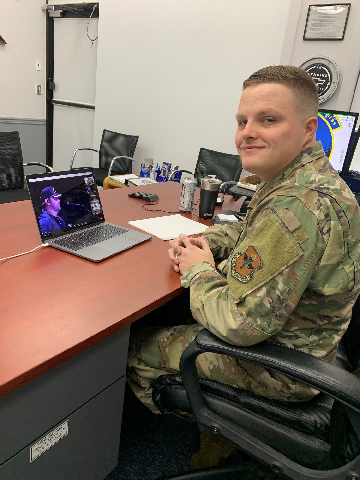 Tech. Sgt. Dexter Tapley, a recruiter with the 361st Recruiting Squadron in Fairbanks, Alaska, takes part in a video teleconference during the taping of the Country Music Television Hot 20 Holiday Salute.