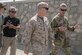 U.S. Army Brig. Gen. Donn H. Hill, right, the commander of Train Advise Assist Command–East, speaks with U.S. Marine Corps Gen. Kenneth F. McKenzie Jr., center, the commander of the U.S. Central Command, during McKenzie’s visit in Jalalabad, Afghanistan, Sept. 9, 2019.
