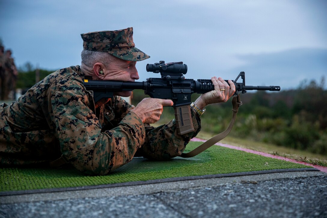 U.S. Marine Corps Brig. Gen. William J. Bowers, commanding general of Marine Corps Installations Pacific, fires the first shot of the day to kickoff the 2020 Far East Intramural Matches on Camp Hansen, Okinawa, Japan, Dec. 7. The competition is held annually to improve Marines’ marksmanship, combat readiness, and proficiency with both a rifle and pistol. (U.S. Marine Corps photo by Lance Cpl. Zachary Larsen)