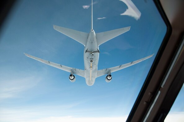 Members of Team McConnell fly a KC-46A Pegasus above another KC-46 during an extended mission in the Indo-Asia-Pacific region on Oct. 23, 2020. This was the first time the KC-46 had flown an extended a self-sustained mission into the region. Overall, the crew was able to offload approximately half a million gallons of fuel to 87 aircraft during their two week mission to Andersen Air Force Base, Guam. (U.S. Air Force photo by Tech. Sgt. Clay Wonders)