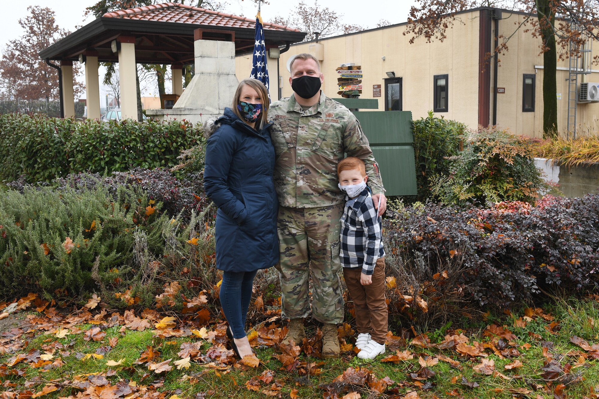 Senior Master Sgt. Sean Winters, 606th Air Control Squadron cyber operations and maintenance superintendent, poses for a photo with his family after being sworn into the U.S. Space Force at Aviano Air Base, Italy, Dec. 3, 2020. After Air Force Space Command was redesignated as the U.S. Space Force in December of 2019, the Department of Defense began consolidating several space missions, units, and career fields into this new branch.