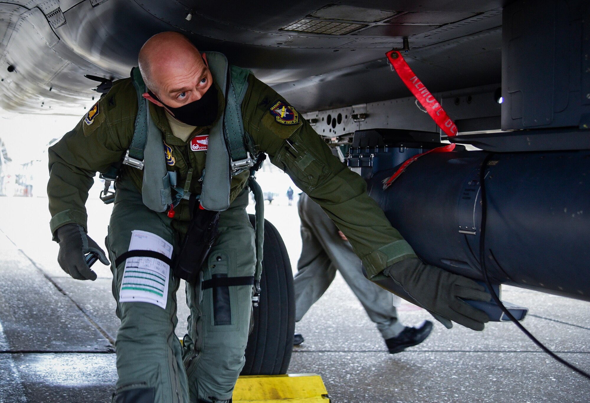 Col. Douglas Creviston, 96th Operations Group commander, performs preflight checks prior to an Emerald Flag mission at Eglin Air Force Base, Fla., Dec. 3, 2020. Emerald Flag was a collaborative multi-service effort focused on increasing the effectiveness of the joint domain warfighter. (U.S. Air Force photo by 1st Lt. Karissa Rodriguez)