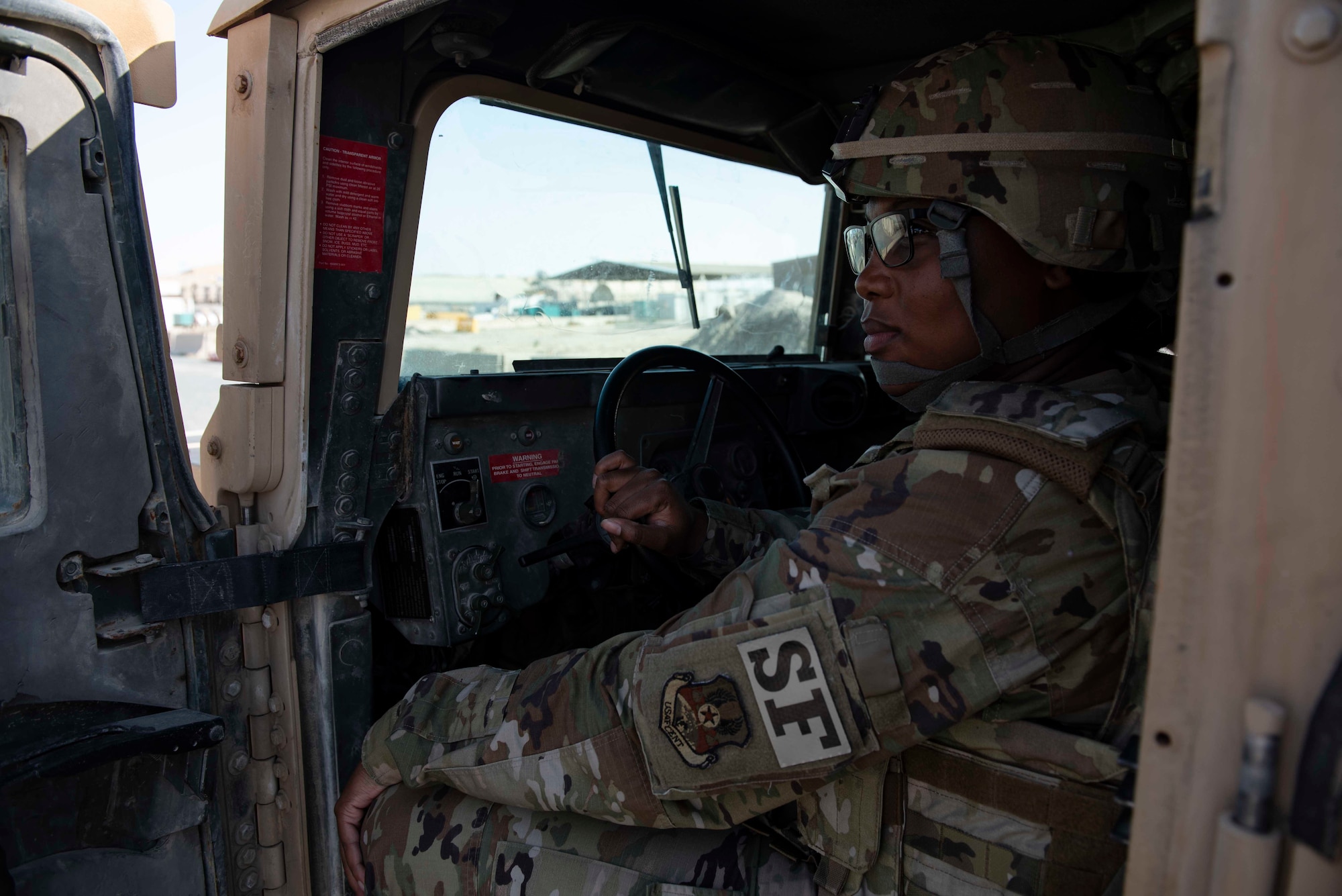 A U.S. Air Force Airman assigned to the 386th Expeditionary Security Forces Squadron, prepares to patrol her area of responsibility during the Marauder 21-02 exercise at Ali Al Salem Air Base, Kuwait, Dec. 8, 2020. The 386th ESFS is able to deter potential adversaries by increasing their patrols. (U.S. Air Force photo by Staff Sgt. Kenneth Boyton)