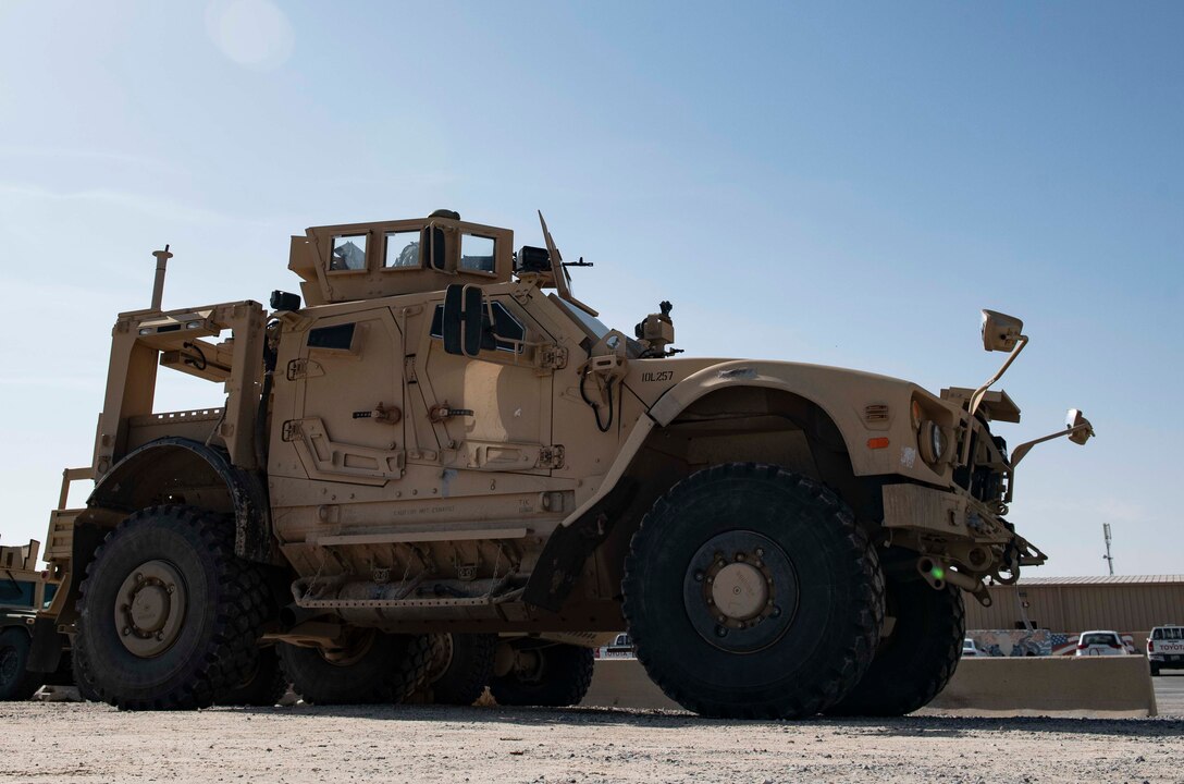 U.S. Air Force Senior Airmen Kenneth Hunter, 386th Expeditionary Security Forces Squadron response force member, secures an M240 machine gun to the turret of a mine-resistant ambush protected all-terrain vehicle, or M-ATV, at Ali Al Salem Air Base, Kuwait, Dec. 9, 2020. The M-ATV is designed to operate on every area of the battlefield and can be configured for a wide array of mission requirements, force structures and threats. (U.S. Air Force photo by Staff Sgt. Kenneth Boyton)