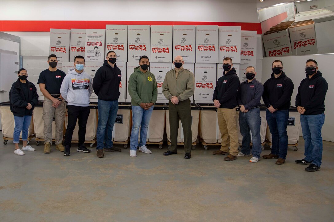 The 19th Sergeant Major of the Marine Corps, Sgt. Maj. Troy E. Black, visits the Headquarters Toys for Tots warehouse in Fredericksburg, Va., Dec. 9, 2020. During the visit Black thanked Marines of Delta Co., 4th Light Armored Reconnaissance Battalion, Marine Forces Reserve and the local volunteers for all their work during the donating season. The Marine Toys for Tots Program collects new unwrapped toys and distributes those toys to less fortunate children during the holidays. (U.S. Marine Corps photo by Sgt. Victoria Ross)