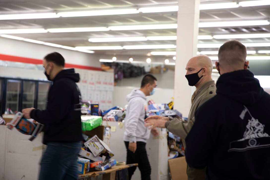 The 19th Sergeant Major of the Marine Corps, Sgt. Maj. Troy E. Black, visits the Headquarters Toys for Tots warehouse in Fredericksburg, Va., Dec. 9, 2020. During the visit Black thanked Marines of Delta Co., 4th Light Armored Reconnaissance Battalion, Marine Forces Reserve and the local volunteers for all their work during the donating season. The Marine Toys for Tots Program collects new unwrapped toys and distributes those toys to less fortunate children during the holidays. (U.S. Marine Corps photo by Sgt. Victoria Ross)