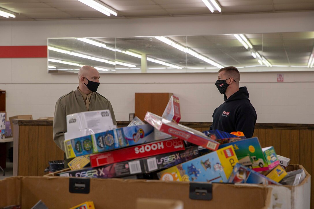 The 19th Sergeant Major of the Marine Corps, Sgt. Maj. Troy E. Black, visits the Headquarters Toys for Tots warehouse in Fredericksburg, Va., Dec. 9, 2020. During the visit Black thanked Marines of Delta Co., 4th Light Armored Reconnaissance Battalion, Marine Forces Reserve and the local volunteers for all their work during the donating season. The Marine Toys for Tots Program collects new unwrapped toys and distributes those toys to less fortunate children during the holidays. (U.S. Marine Corps photo by Sgt. Victoria Ross)