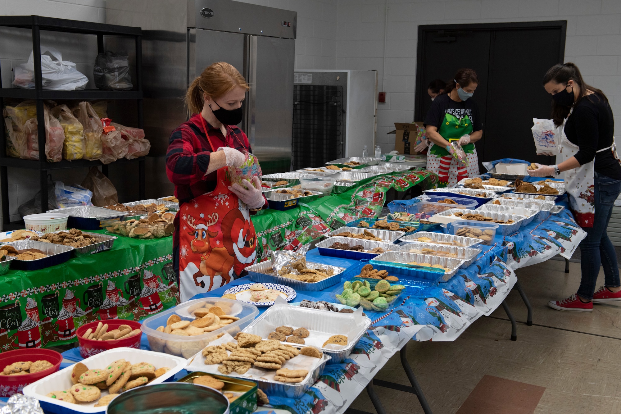 A photo of volunteers sorting cookies.