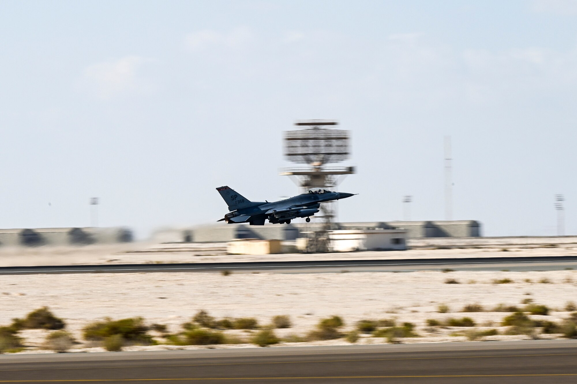 A U.S Air Force F-16 Fighting Falcon assigned to the 480th Expeditionary Fighter Squadron launches in support of a Bomber Task Force mission from Al Dhafra Air Base, United Arab Emirates, Dec. 10, 2020. The Bomber Task Force consisted of two B-52 Stratofortress aircraft from Barksdale Air Force Base, Louisiana. (U.S. Air Force photo by Staff Sgt. Miranda A. Loera)