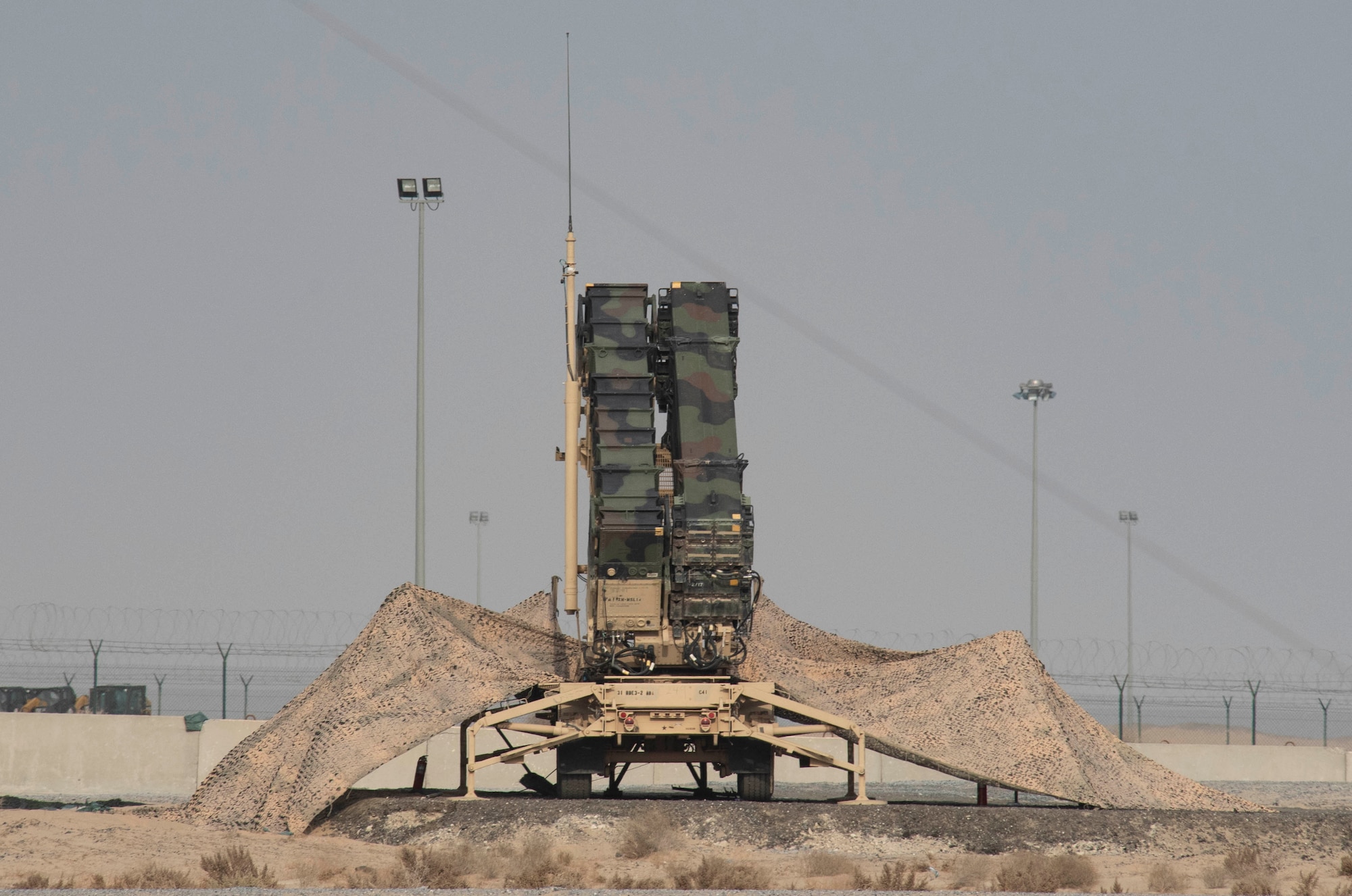 A Patriot missile launcher stands ready to destroy any incoming threats at Ali Al Salem Air Base, Kuwait, Nov. 20, 2020. The Patriot missile system is an integral component to the safety of the base, and is used to seek and destroy aerial threats. (U.S. Air Force photo by Staff Sgt. Kenneth Boyton)