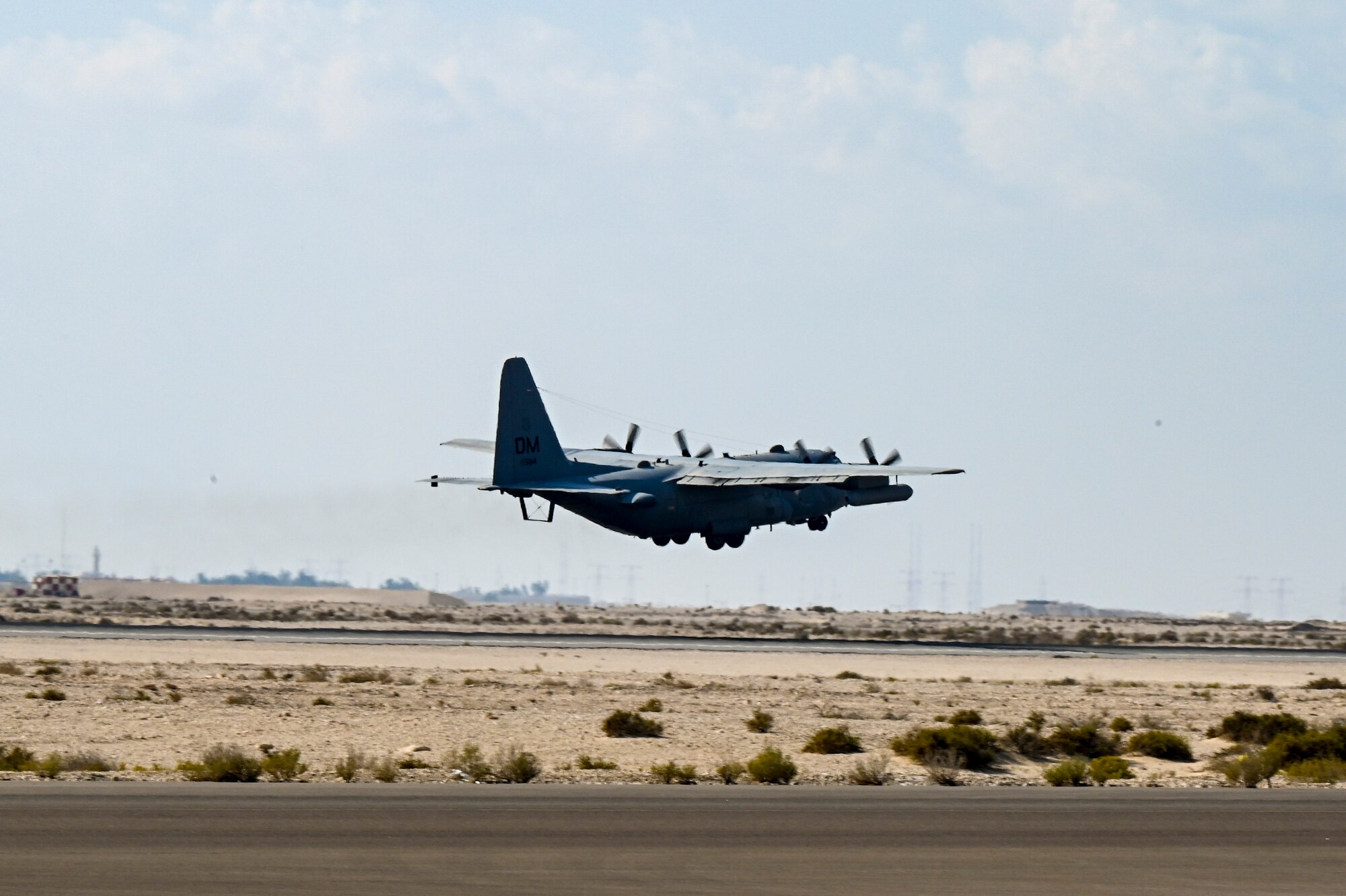 A U.S. Air Force EC-130H Compass Call assigned to the 41st Expeditionary Electronic Combat Squadron takes off at Al Dhafra Air Base, United Arab Emirates, Dec. 10, 2020.  Aircraft assigned to the 380th Air Expeditionary Wing launched in support of a bomber task force mission in the U.S. Central Command theater of operations  (U.S. Air Force photo by Staff Sgt. Miranda A. Loera)