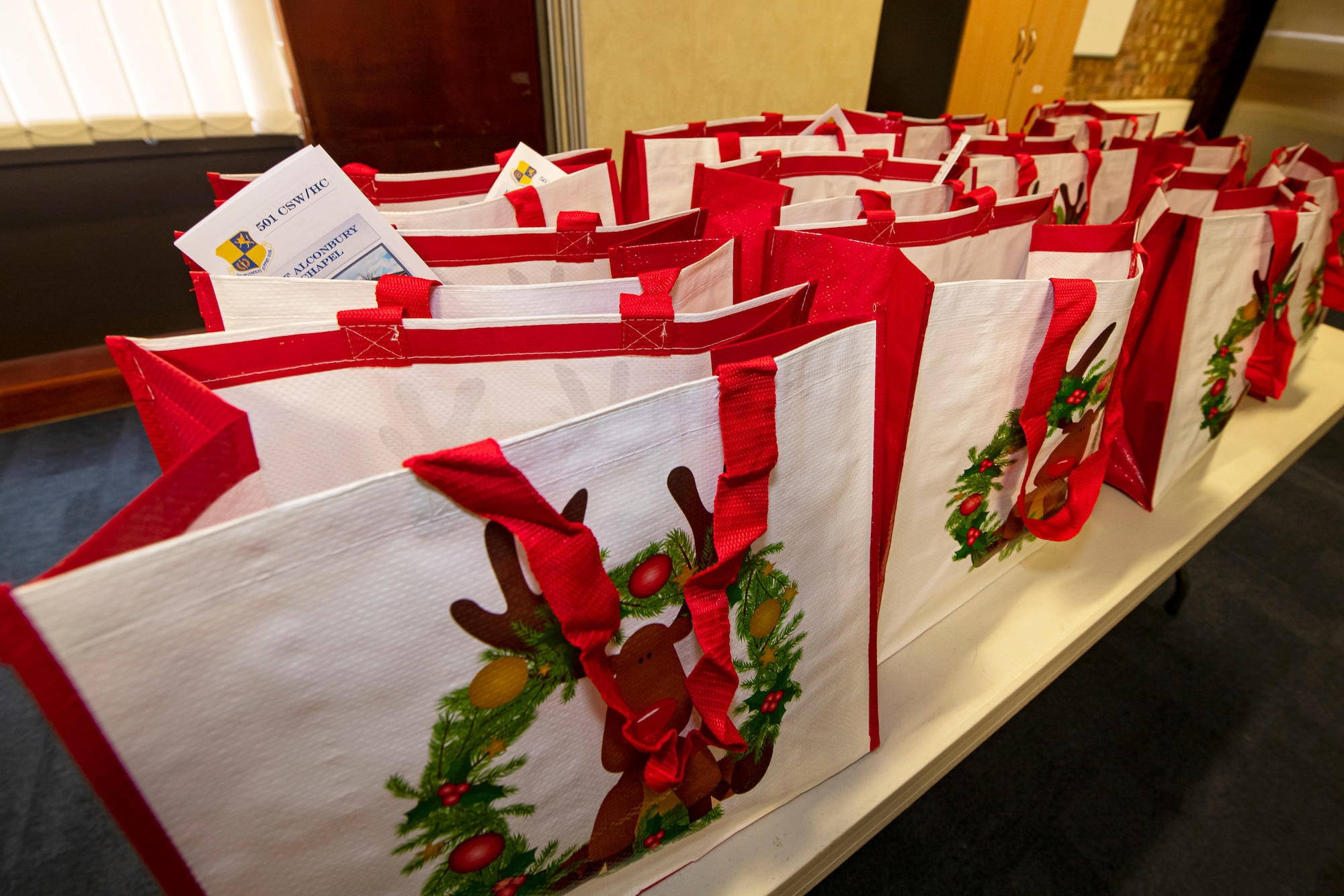Care packages rest on a table at RAF Alconbury, England, Dec. 7, 2020. The RAF Alconbury chaplain team have been providing care packages for Airmen and families currently in quarantine. (U.S. Air Force photo by Senior Airman Eugene Oliver)