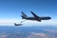 White Sands National Park can be seen in the distance at a KC-46 Pegasus from the 56th Air Refueling Squadron at Altus Air Force Base (AFB), Oklahoma, refuels an F-16 Fighting Falcon from the 49th Wing at Holloman AFB, New Mexico, December 7, 2020. Two KC-46s practiced air refueling operations over New Mexico with ten F-16s from Holloman AFB. (Courtesy photo by 1st Lt. Daniel Lee)