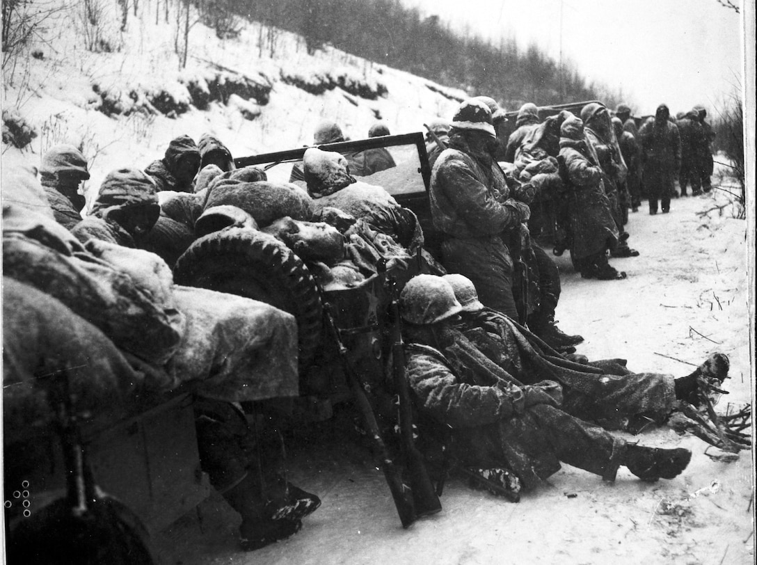 U.S. Marines wait to withdraw from the Chosin Reservoir area circa, Dec. 1950.