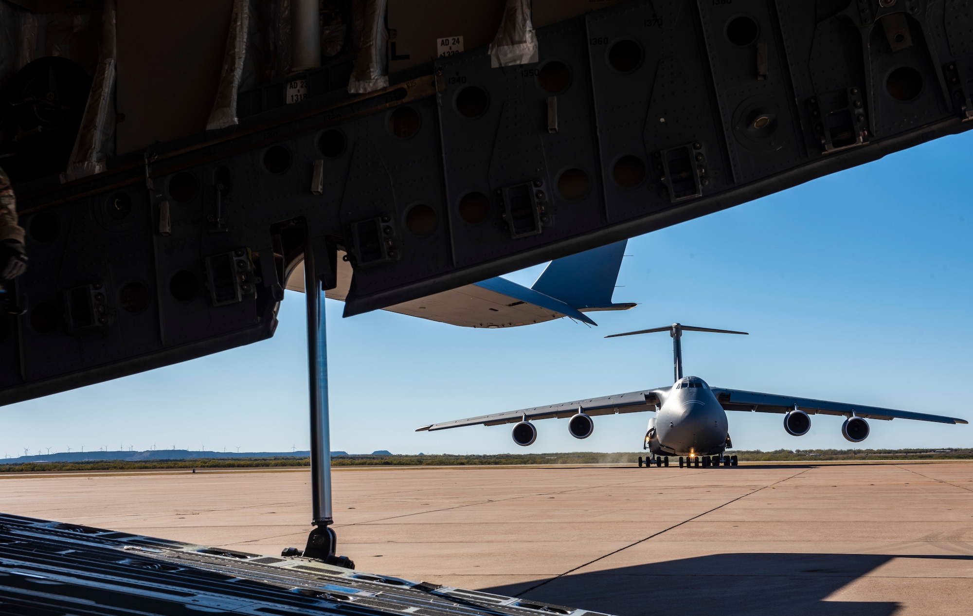 A C-5M Super Galaxy prepares to park on the flightline at Dyess Air Force Base, Texas, Nov. 25, 2020.