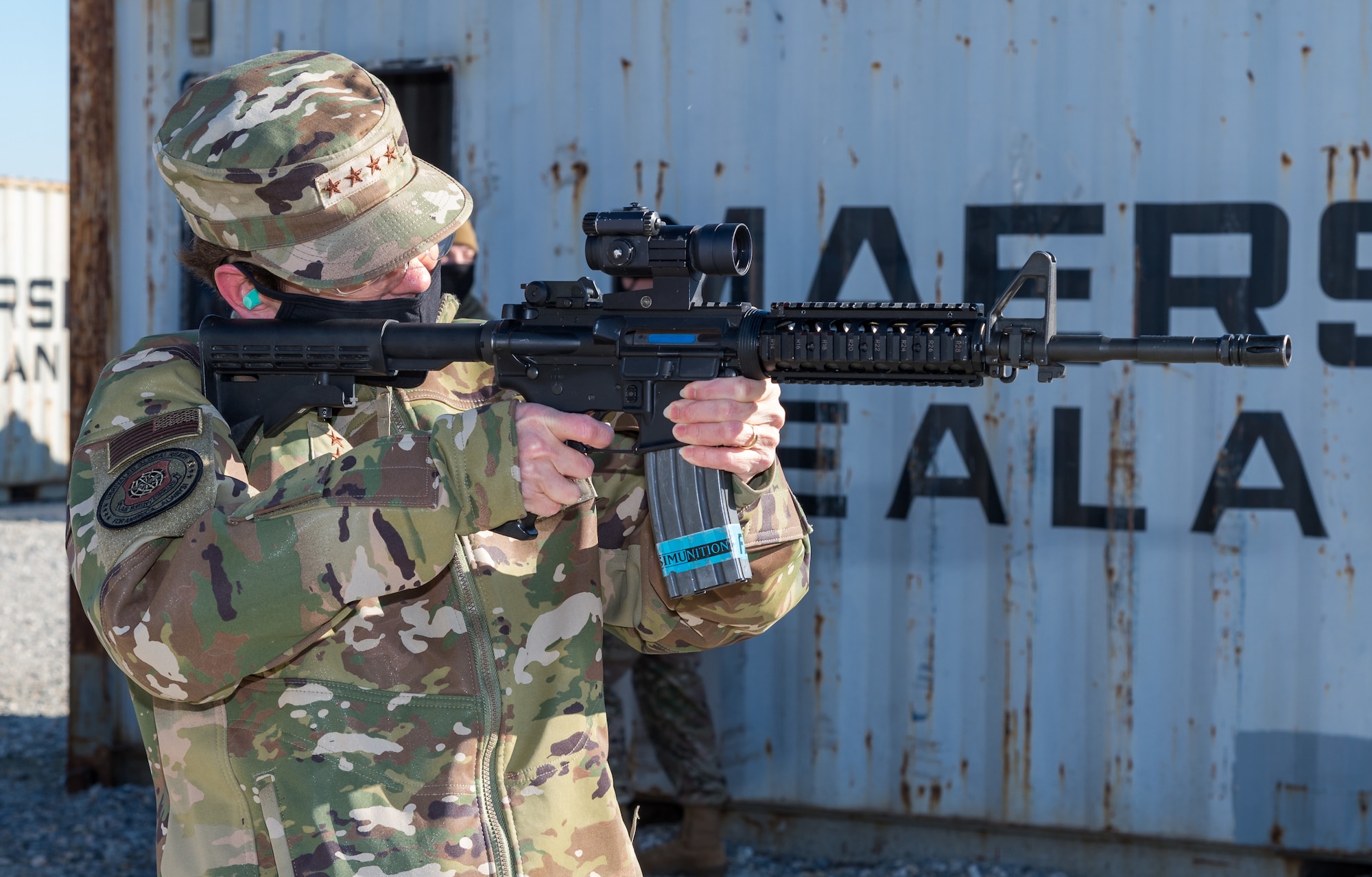 Gen. Jacqueline Van Ovost, Air Mobility Command commander, fires an M4 carbine during her visit to the Tactics and Leadership Nexus facility, Dec. 8, 2020, at Dover Air Force Base, Delaware. During her visit, Van Ovost witnessed firsthand how Dover AFB supports AMC’s priorities of enhancing full-spectrum readiness and developing innovative, multi-capable Airmen. (U.S. Air Force photo by Roland Balik)