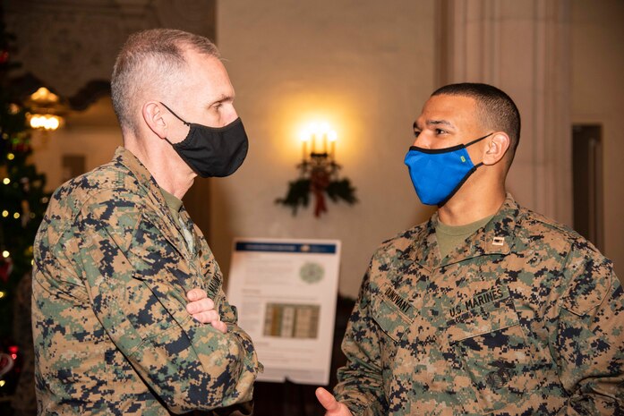 Assistant Commandant for the Marine Corps Gen. Gary Thomas talks with Naval Postgraduate School Information Warfare student Marine Corps Capt. Matt Dunovant during a visit to the university, Dec. 9.