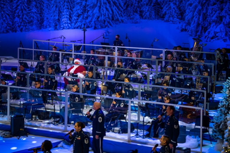 The U.S. Air Force Concert Band and Singing Sergeants perform during their holiday special, “Season of Hope,” while Santa look on at the MGM National Harbor. (U.S. Air Force Photo by Chief Master Sgt. Kevin Burns)